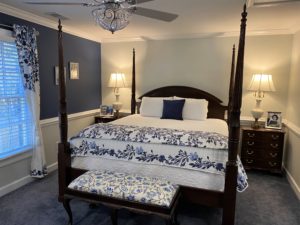 King Bed, blue walls, poster bed
